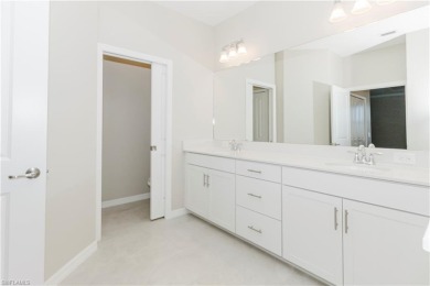 Step into luxury with this stunning Baycreek floorplan nestled on Panther Run Golf Club in Florida - for sale on GolfHomes.com, golf home, golf lot