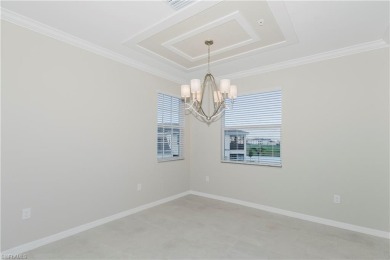 Step into luxury with this stunning Baycreek floorplan nestled on Panther Run Golf Club in Florida - for sale on GolfHomes.com, golf home, golf lot