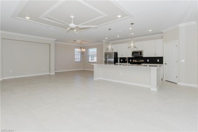 Step into luxury with this stunning Baycreek floorplan nestled on Panther Run Golf Club in Florida - for sale on GolfHomes.com, golf home, golf lot