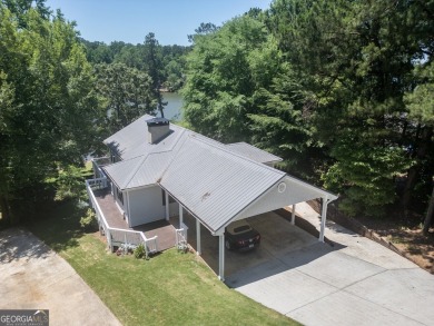 Lakeview 3-bedroom & 2-bathroom home with private access to the on Turtle Cove Golf Course in Georgia - for sale on GolfHomes.com, golf home, golf lot