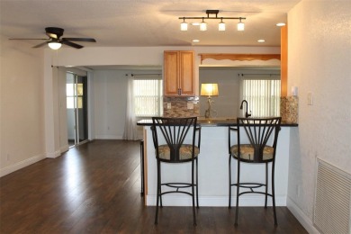 This is a very special remodeled, Drayton, single family home on Mainlands Golf Club in Florida - for sale on GolfHomes.com, golf home, golf lot