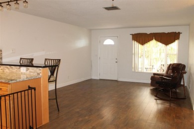 This is a very special remodeled, Drayton, single family home on Mainlands Golf Club in Florida - for sale on GolfHomes.com, golf home, golf lot