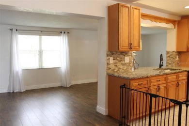 This is a very special remodeled, Drayton, single family home on Mainlands Golf Club in Florida - for sale on GolfHomes.com, golf home, golf lot