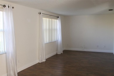 This is a very special remodeled, Drayton, single family home on Mainlands Golf Club in Florida - for sale on GolfHomes.com, golf home, golf lot