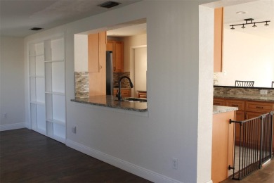 This is a very special remodeled, Drayton, single family home on Mainlands Golf Club in Florida - for sale on GolfHomes.com, golf home, golf lot
