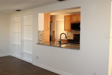 This is a very special remodeled, Drayton, single family home on Mainlands Golf Club in Florida - for sale on GolfHomes.com, golf home, golf lot