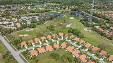 Welcome to this beautifully maintained three-bedroom on Martin Downs Country Club in Florida - for sale on GolfHomes.com, golf home, golf lot