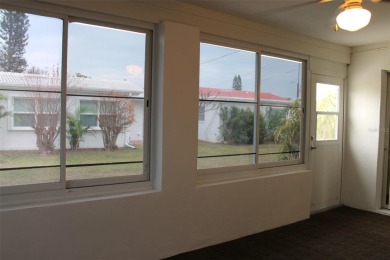 This is a very special remodeled, Drayton, single family home on Mainlands Golf Club in Florida - for sale on GolfHomes.com, golf home, golf lot