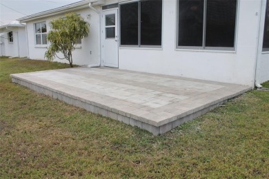 This is a very special remodeled, Drayton, single family home on Mainlands Golf Club in Florida - for sale on GolfHomes.com, golf home, golf lot