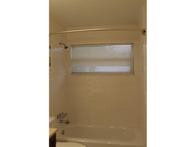 This is a very special remodeled, Drayton, single family home on Mainlands Golf Club in Florida - for sale on GolfHomes.com, golf home, golf lot