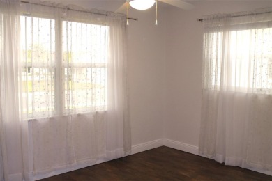 This is a very special remodeled, Drayton, single family home on Mainlands Golf Club in Florida - for sale on GolfHomes.com, golf home, golf lot