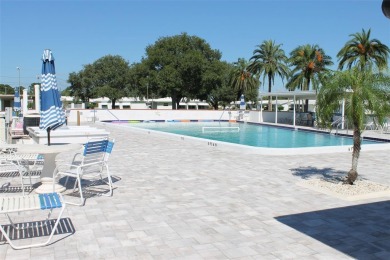 This is a very special remodeled, Drayton, single family home on Mainlands Golf Club in Florida - for sale on GolfHomes.com, golf home, golf lot
