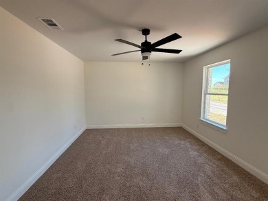 Don't miss this opportunity! This two-story, 4-bedroom, 3-bath on Holiday Hills Country Club in Texas - for sale on GolfHomes.com, golf home, golf lot