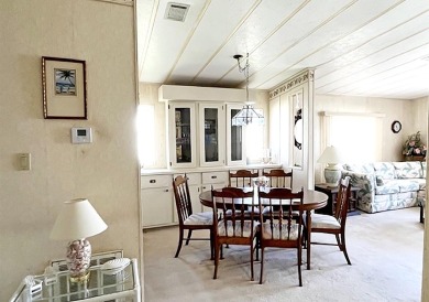 This pretty home is waiting for someone to give it some love on Del Tura Golf and Country Club in Florida - for sale on GolfHomes.com, golf home, golf lot