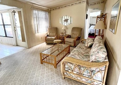 This pretty home is waiting for someone to give it some love on Del Tura Golf and Country Club in Florida - for sale on GolfHomes.com, golf home, golf lot