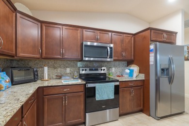 Beautifully Maintained 2-bed, 2-bath home in the welcoming 55+ on Spanish Lakes I in Florida - for sale on GolfHomes.com, golf home, golf lot