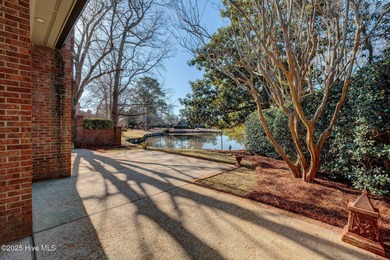 ***NEW PHOTOS. Breath taking views over the pond behind the on Country Club of Landfall in North Carolina - for sale on GolfHomes.com, golf home, golf lot
