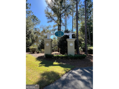 Build your dream home on this beautiful 0.65-acre lakefront lot on The Club At Osprey Cove in Georgia - for sale on GolfHomes.com, golf home, golf lot