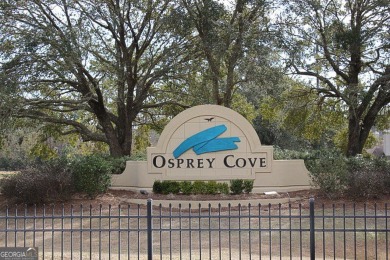 Build your dream home on this beautiful 0.65-acre lakefront lot on The Club At Osprey Cove in Georgia - for sale on GolfHomes.com, golf home, golf lot