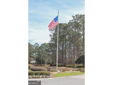 Build your dream home on this beautiful 0.65-acre lakefront lot on The Club At Osprey Cove in Georgia - for sale on GolfHomes.com, golf home, golf lot