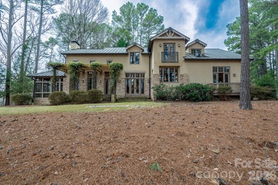 Welcome home to resort living in what feels like your mountain on Old North State Club at Uwharrie Point Golf community in North Carolina - for sale on GolfHomes.com, golf home, golf lot