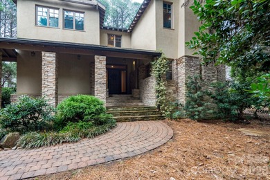 Welcome home to resort living in what feels like your mountain on Old North State Club at Uwharrie Point Golf community in North Carolina - for sale on GolfHomes.com, golf home, golf lot