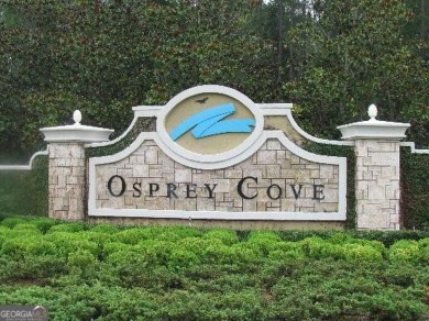 Build your dream home on this beautiful 0.65-acre lakefront lot on The Club At Osprey Cove in Georgia - for sale on GolfHomes.com, golf home, golf lot