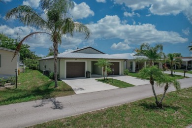 Beautifully Maintained 2-bed, 2-bath home in the welcoming 55+ on Spanish Lakes I in Florida - for sale on GolfHomes.com, golf home, golf lot