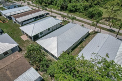 Beautifully Maintained 2-bed, 2-bath home in the welcoming 55+ on Spanish Lakes I in Florida - for sale on GolfHomes.com, golf home, golf lot
