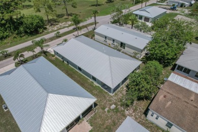 Beautifully Maintained 2-bed, 2-bath home in the welcoming 55+ on Spanish Lakes I in Florida - for sale on GolfHomes.com, golf home, golf lot