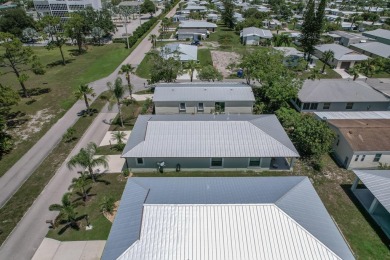 Beautifully Maintained 2-bed, 2-bath home in the welcoming 55+ on Spanish Lakes I in Florida - for sale on GolfHomes.com, golf home, golf lot
