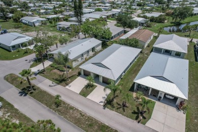 Beautifully Maintained 2-bed, 2-bath home in the welcoming 55+ on Spanish Lakes I in Florida - for sale on GolfHomes.com, golf home, golf lot
