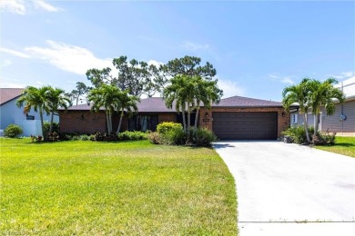 Wake up to sweeping golf course views in this distinctive on Palmetto-Pine Country Club in Florida - for sale on GolfHomes.com, golf home, golf lot