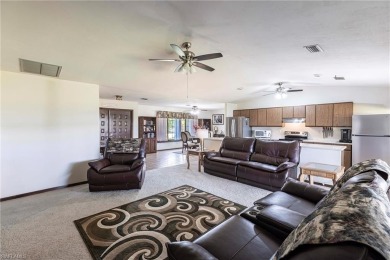 Wake up to sweeping golf course views in this distinctive on Palmetto-Pine Country Club in Florida - for sale on GolfHomes.com, golf home, golf lot
