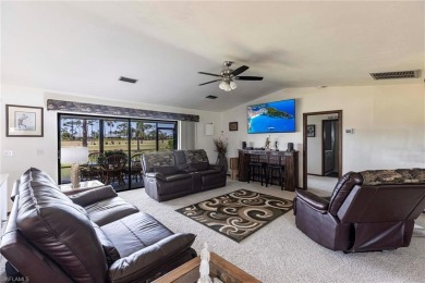 Wake up to sweeping golf course views in this distinctive on Palmetto-Pine Country Club in Florida - for sale on GolfHomes.com, golf home, golf lot