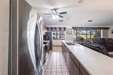 Wake up to sweeping golf course views in this distinctive on Palmetto-Pine Country Club in Florida - for sale on GolfHomes.com, golf home, golf lot