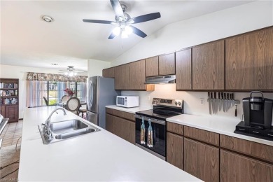 Wake up to sweeping golf course views in this distinctive on Palmetto-Pine Country Club in Florida - for sale on GolfHomes.com, golf home, golf lot