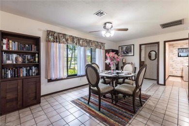 Wake up to sweeping golf course views in this distinctive on Palmetto-Pine Country Club in Florida - for sale on GolfHomes.com, golf home, golf lot