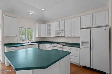 Take in peaceful views of Lake Pinehurst at this inviting, all on Pinehurst Resort and Country Club in North Carolina - for sale on GolfHomes.com, golf home, golf lot