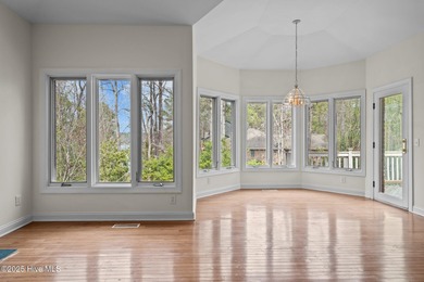 Take in peaceful views of Lake Pinehurst at this inviting, all on Pinehurst Resort and Country Club in North Carolina - for sale on GolfHomes.com, golf home, golf lot