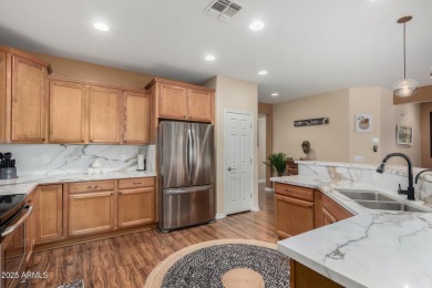 LIVE THE GOOD LIFE IN SUN CITY! This charming PROVIDENCE home is on Poston Butte Golf Club in Arizona - for sale on GolfHomes.com, golf home, golf lot