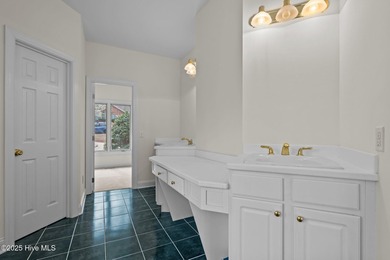 Take in peaceful views of Lake Pinehurst at this inviting, all on Pinehurst Resort and Country Club in North Carolina - for sale on GolfHomes.com, golf home, golf lot