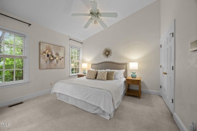 Nestled on a desirable corner lot, surrounded by mature trees in on Devils Ridge Golf Club in North Carolina - for sale on GolfHomes.com, golf home, golf lot