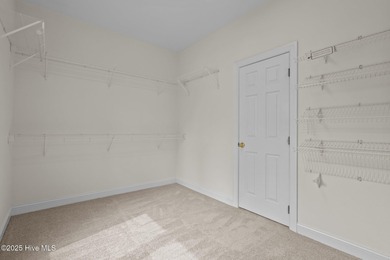 Take in peaceful views of Lake Pinehurst at this inviting, all on Pinehurst Resort and Country Club in North Carolina - for sale on GolfHomes.com, golf home, golf lot