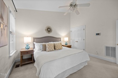 Nestled on a desirable corner lot, surrounded by mature trees in on Devils Ridge Golf Club in North Carolina - for sale on GolfHomes.com, golf home, golf lot
