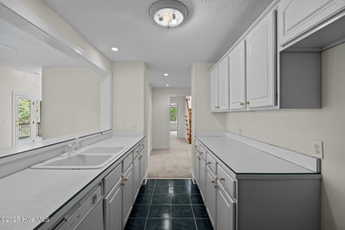 Take in peaceful views of Lake Pinehurst at this inviting, all on Pinehurst Resort and Country Club in North Carolina - for sale on GolfHomes.com, golf home, golf lot