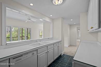 Take in peaceful views of Lake Pinehurst at this inviting, all on Pinehurst Resort and Country Club in North Carolina - for sale on GolfHomes.com, golf home, golf lot