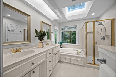 Nestled on a desirable corner lot, surrounded by mature trees in on Devils Ridge Golf Club in North Carolina - for sale on GolfHomes.com, golf home, golf lot
