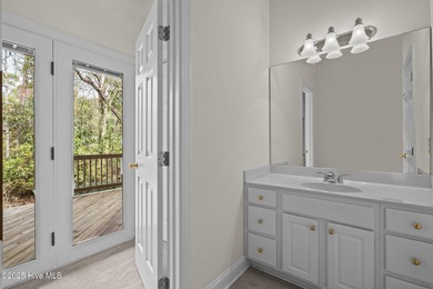 Take in peaceful views of Lake Pinehurst at this inviting, all on Pinehurst Resort and Country Club in North Carolina - for sale on GolfHomes.com, golf home, golf lot