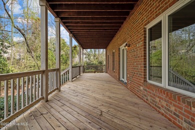Take in peaceful views of Lake Pinehurst at this inviting, all on Pinehurst Resort and Country Club in North Carolina - for sale on GolfHomes.com, golf home, golf lot